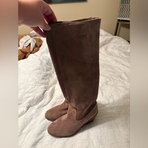 Knee high suede wedge boots.